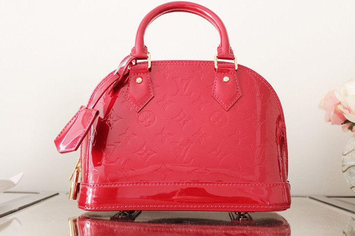 Louis Vuitton Alma BB - it comes with a shoulder strap so you can wear it 3 ways!